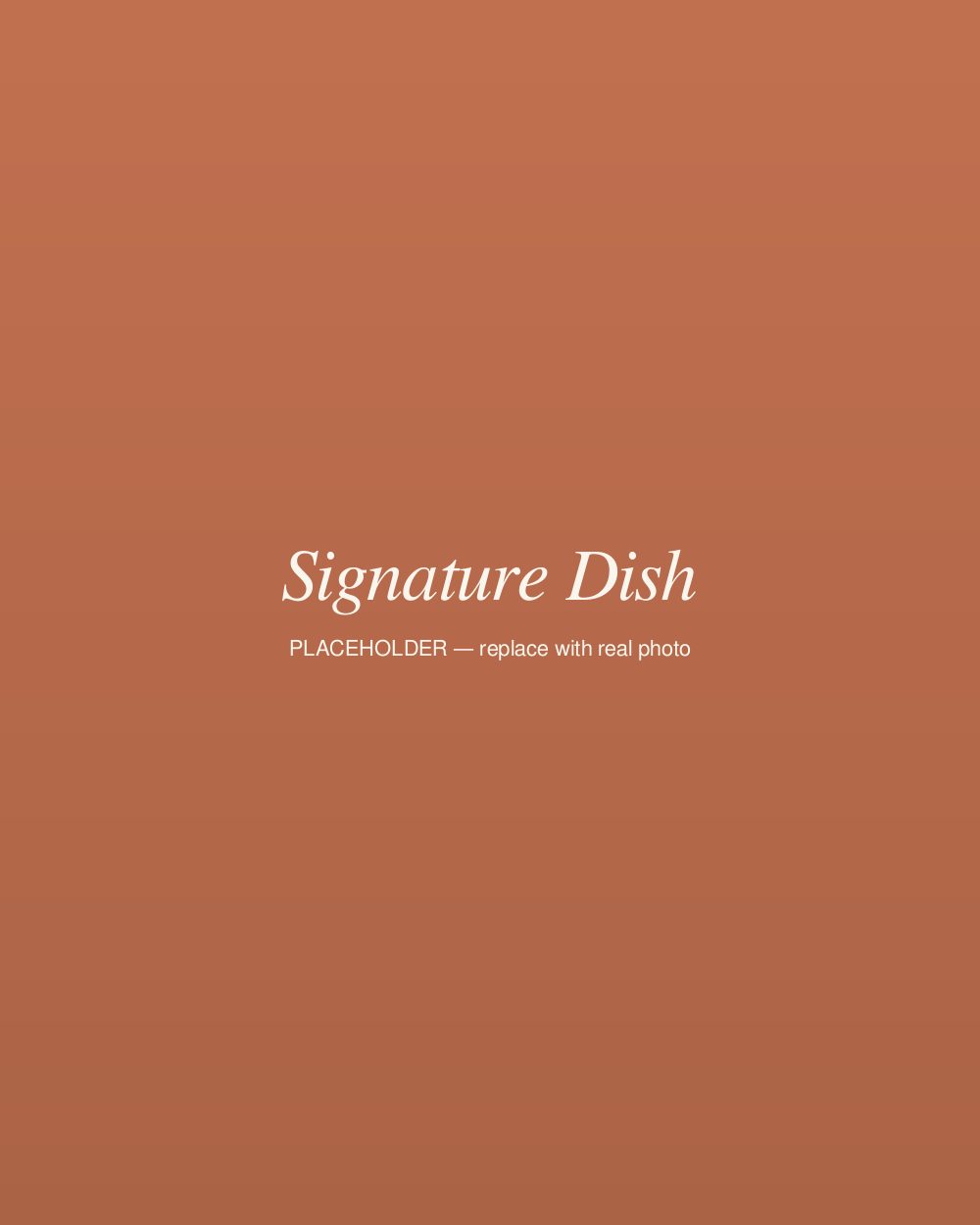 Signature plated dish with edible flowers