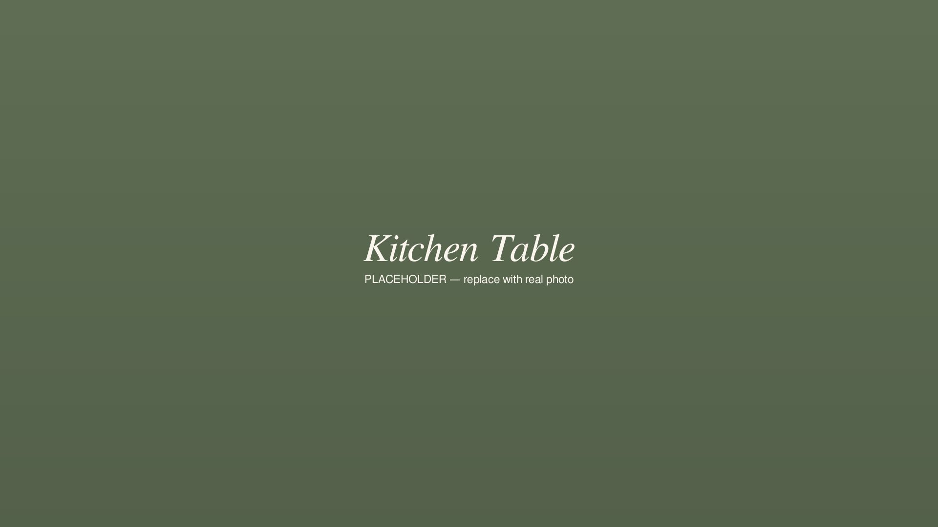 The Kitchen Table counter at Unalome, set for six guests facing the open kitchen